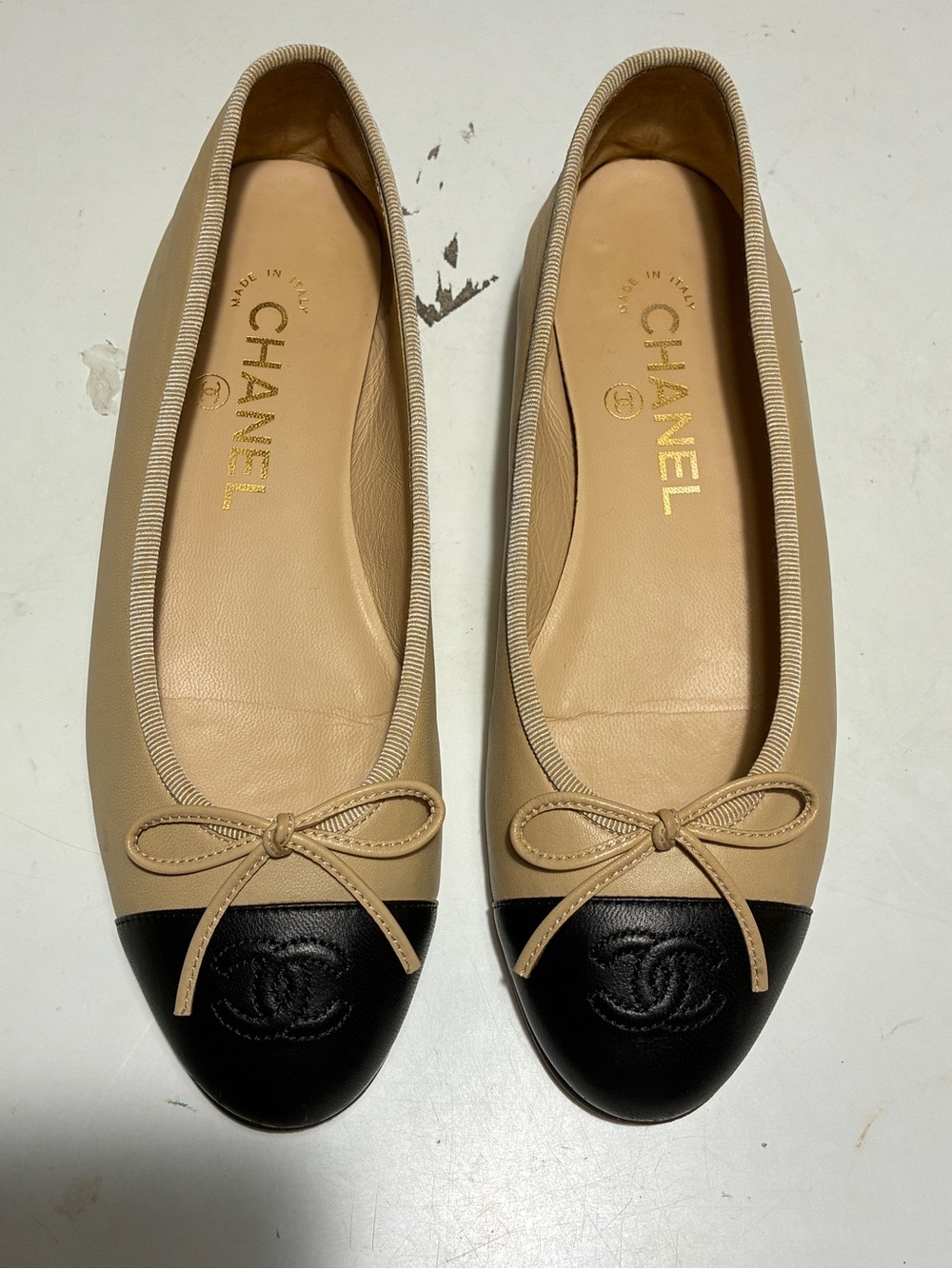 CHANEL Beige Leather Ballet Flats with Black Cap Toe